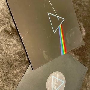 Pink Floyd - Dark Side of the Moon.  Opened, no damage to vinyl.